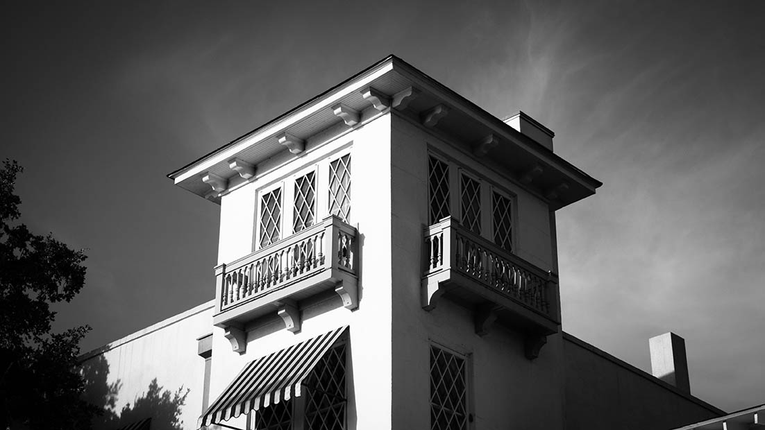 Reed's black and white photo of a shadowy building corner