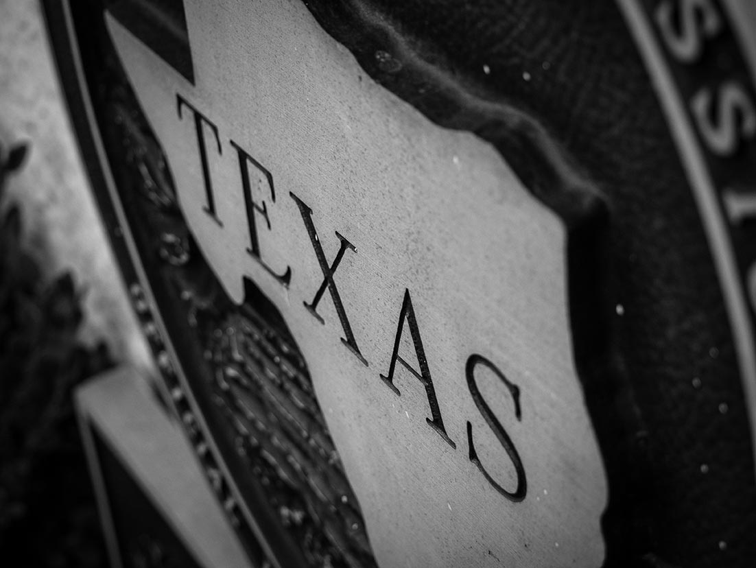reed's black and white Photo of Texas state seal
